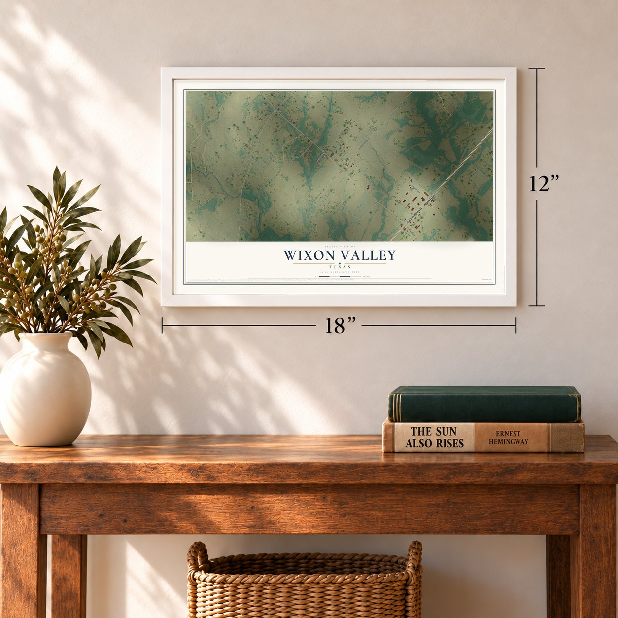 Wixon Valley, Texas map, 12 x 18 inch print in a white frame in an entryway