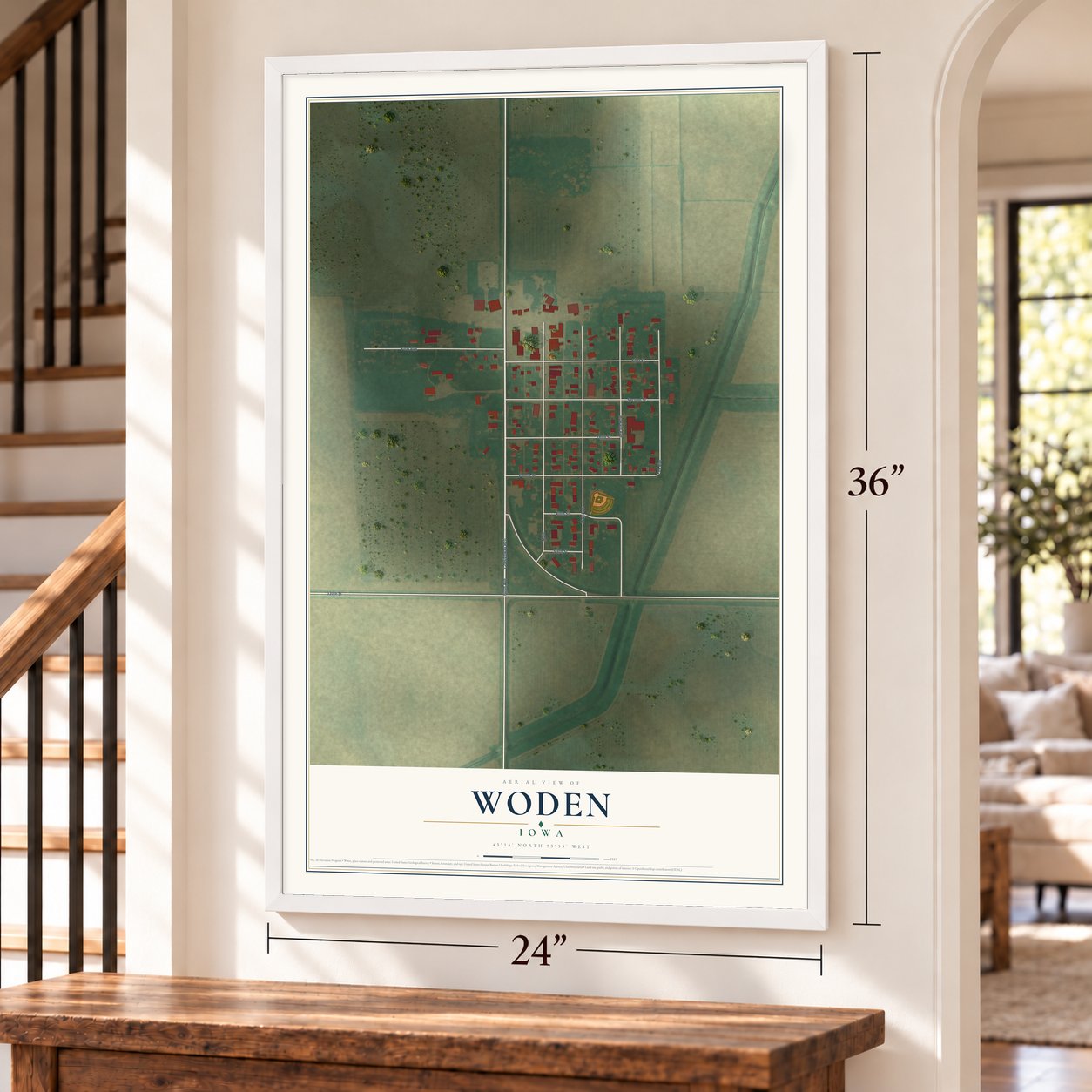 Woden, Iowa map, 24 x 36 inch print in a white frame by a staircase