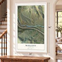 Wolcott, Colorado map, 24 x 36 inch print in a white frame by a staircase