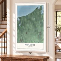 Wolcott, New York map, 24 x 36 inch print in a white frame by a staircase