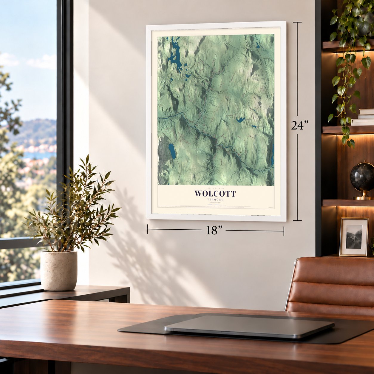Wolcott, Vermont map, 18 x 24 inch print in a white frame in a home office