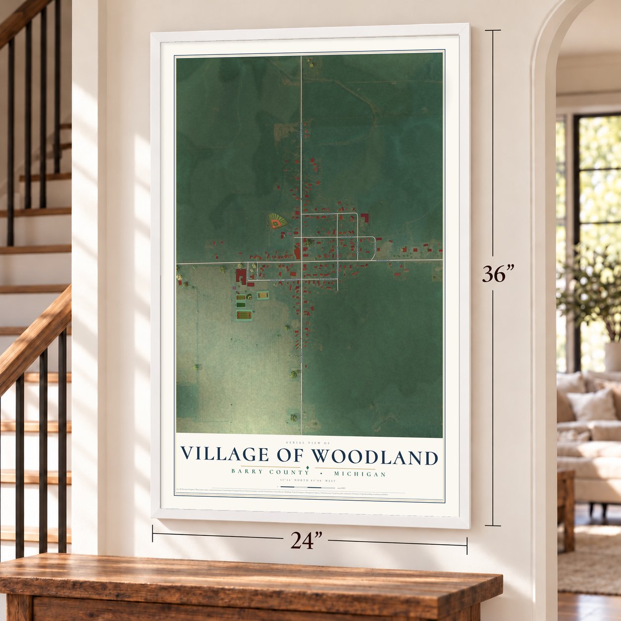 Woodland, Michigan map, 24 x 36 inch print in a white frame by a staircase