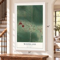 Woodland, Mississippi map, 24 x 36 inch print in a white frame by a staircase