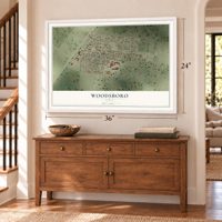 Woodsboro, Texas map, 24 x 36 inch print in a white frame above a dresser by a staircase