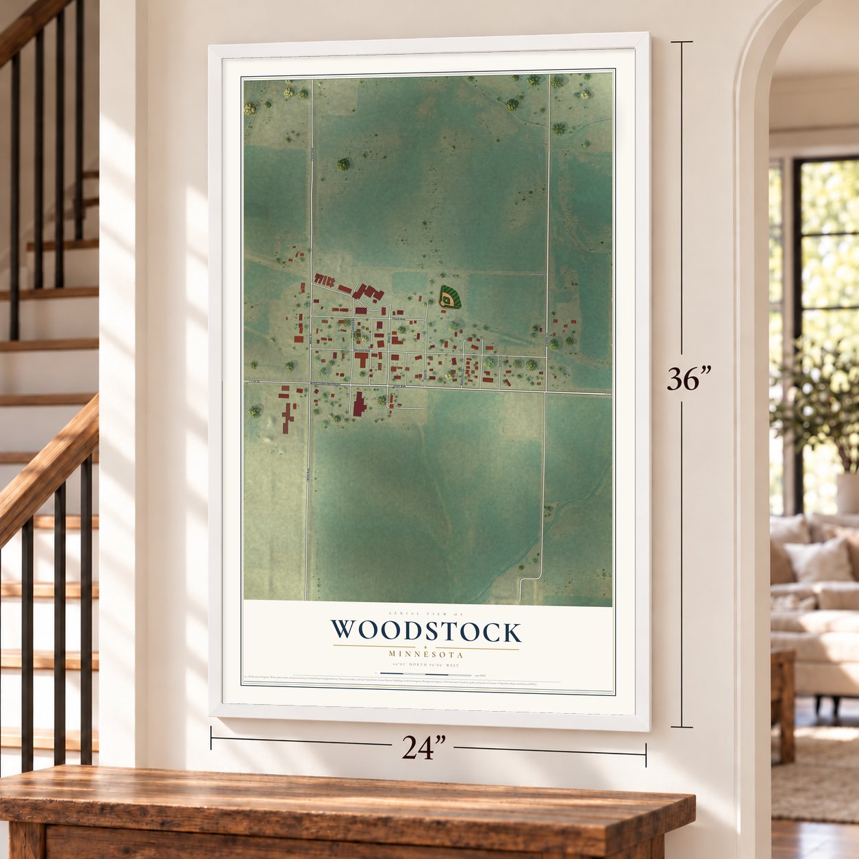 Woodstock, Minnesota map, 24 x 36 inch print in a white frame by a staircase