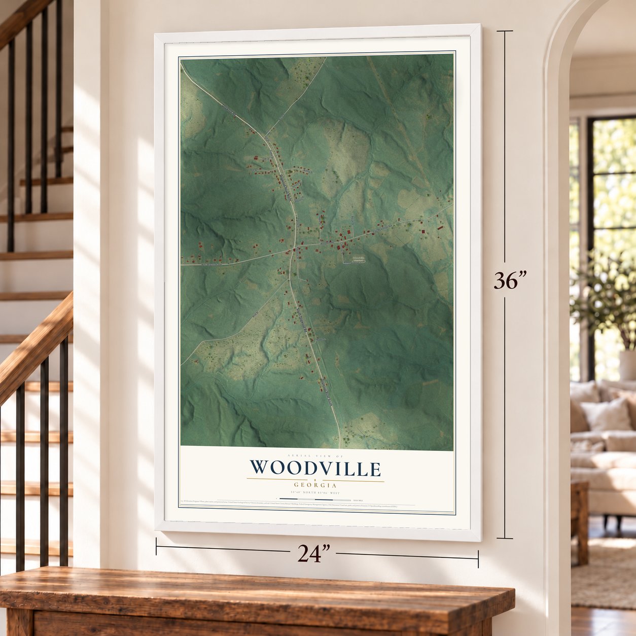Woodville, Georgia map, 24 x 36 inch print in a white frame by a staircase