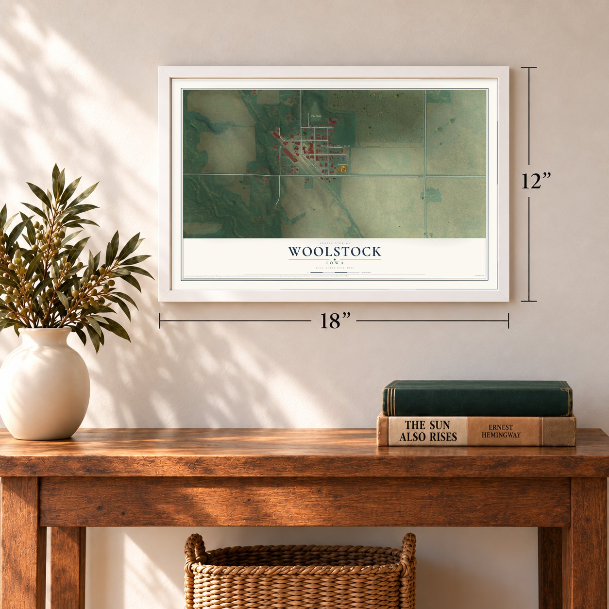 Woolstock, Iowa map, 12 x 18 inch print in a white frame in an entryway