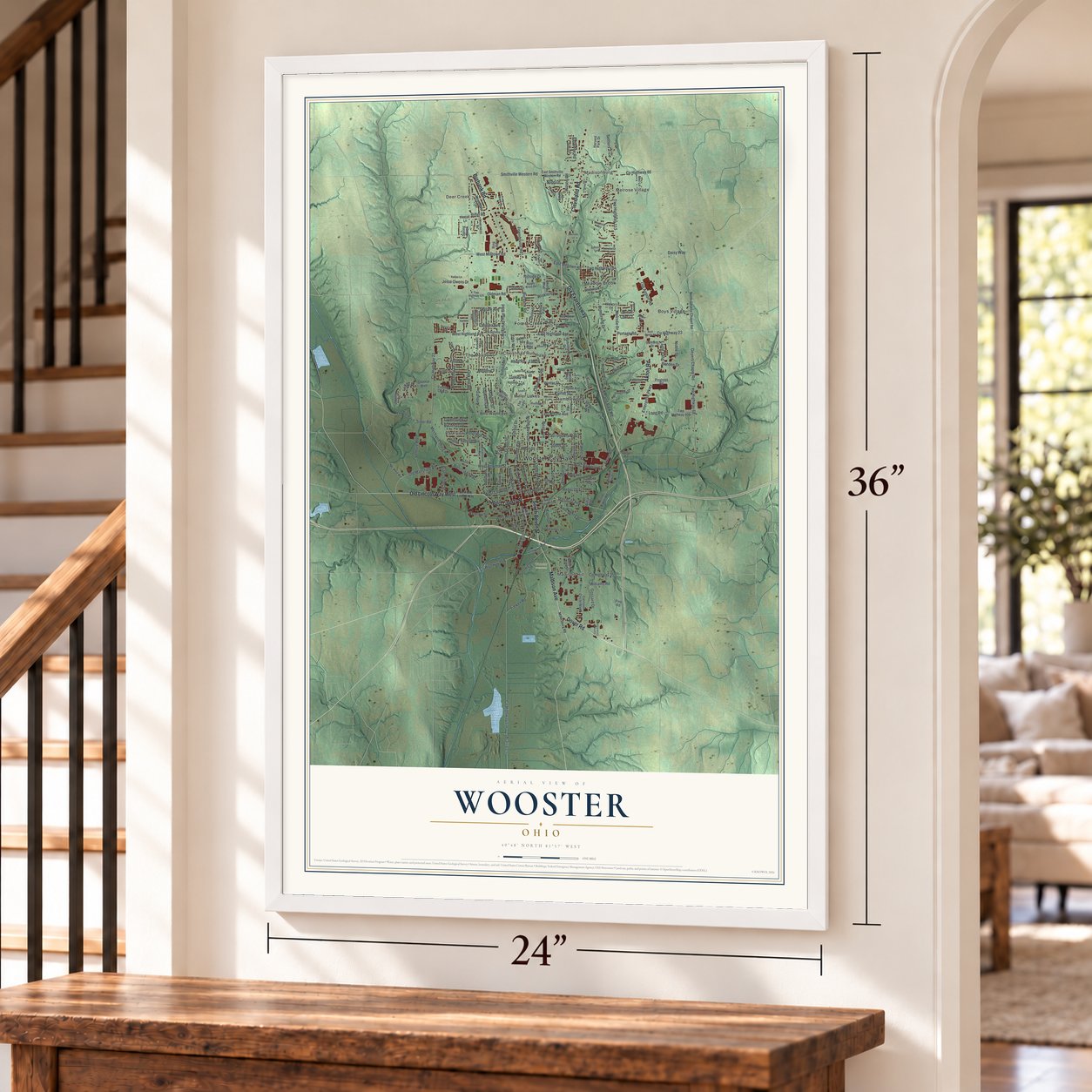 Wooster, Ohio map, 24 x 36 inch print in a white frame by a staircase