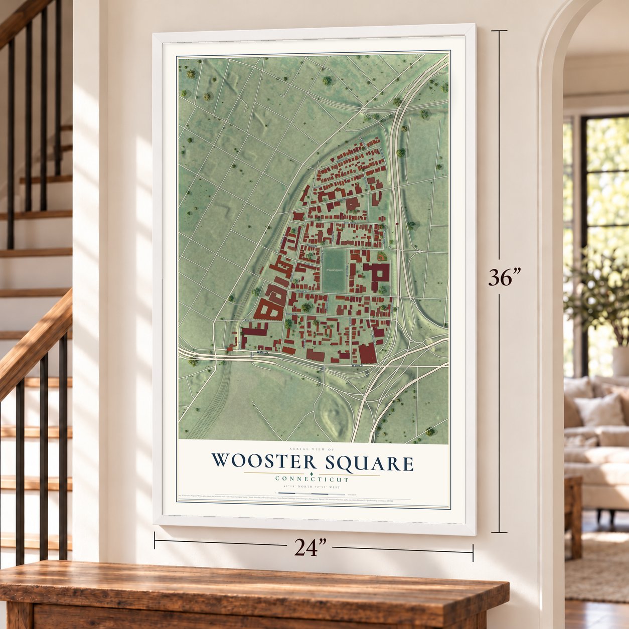 Wooster Square, Connecticut map, 24 x 36 inch print in a white frame by a staircase