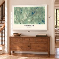 Wrentham, Massachusetts map, 24 x 36 inch print in a white frame above a dresser by a staircase