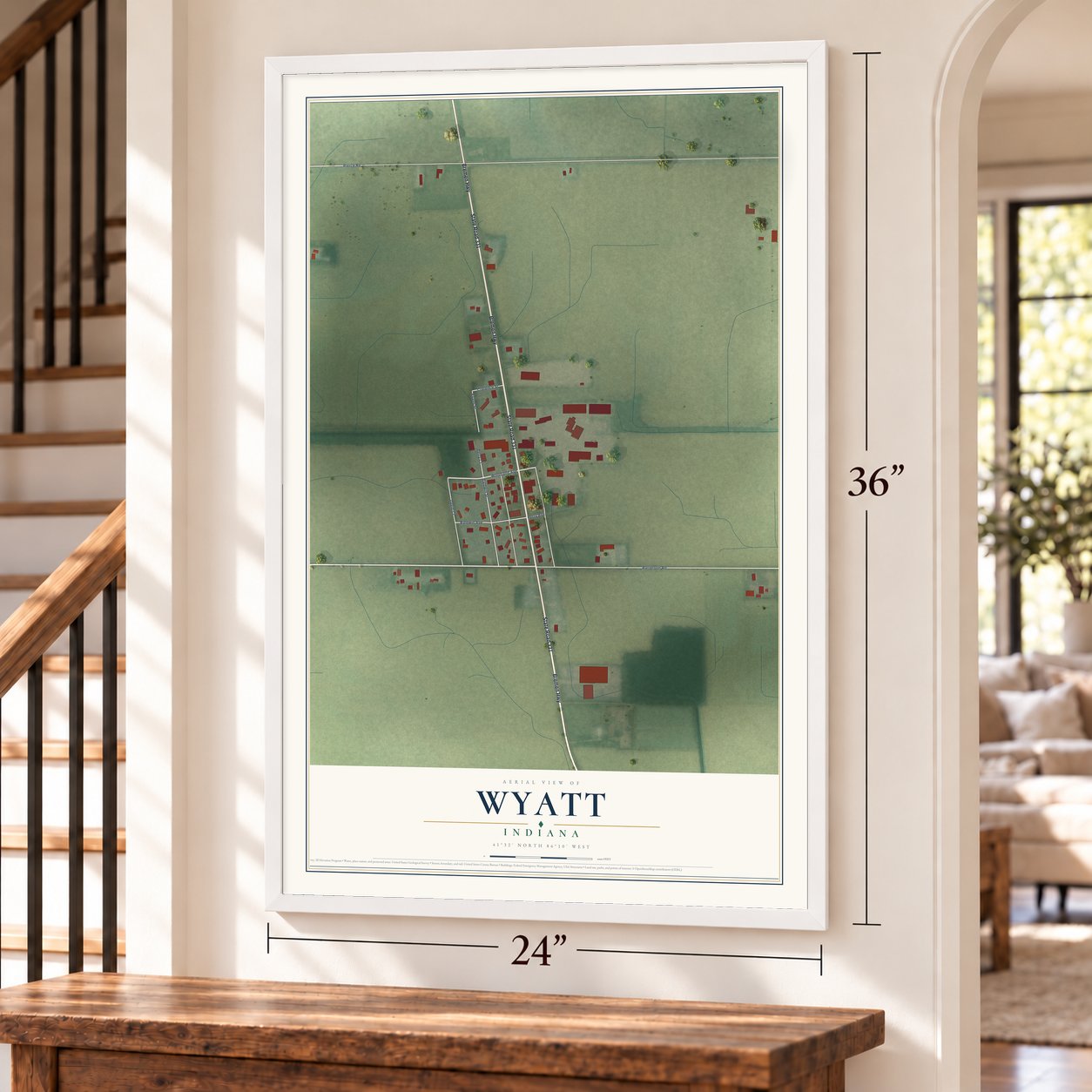 Wyatt, Indiana map, 24 x 36 inch print in a white frame by a staircase