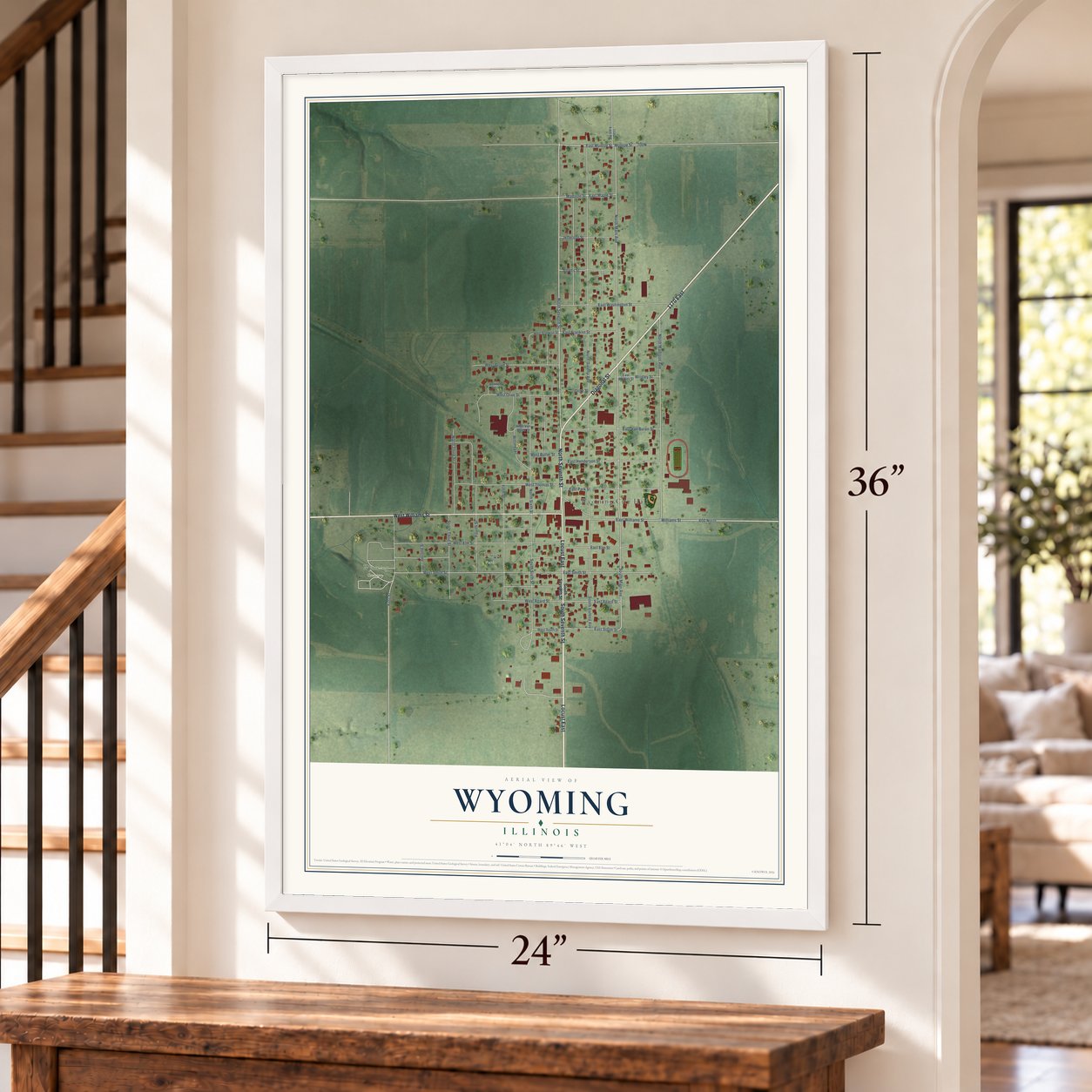 Wyoming, Illinois map, 24 x 36 inch print in a white frame by a staircase