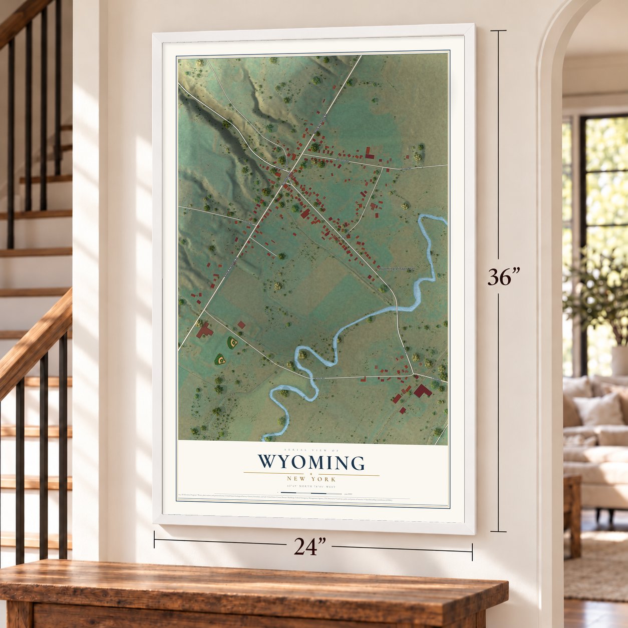 Wyoming, New York map, 24 x 36 inch print in a white frame by a staircase