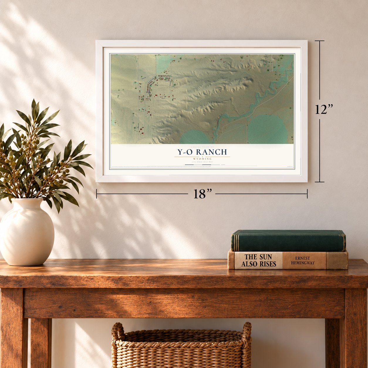 Y-O Ranch, Wyoming map, 12 x 18 inch print in a white frame in an entryway