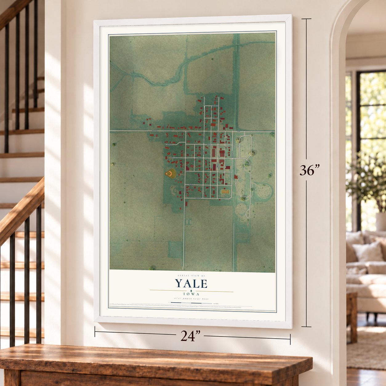Yale, Iowa map, 24 x 36 inch print in a white frame by a staircase