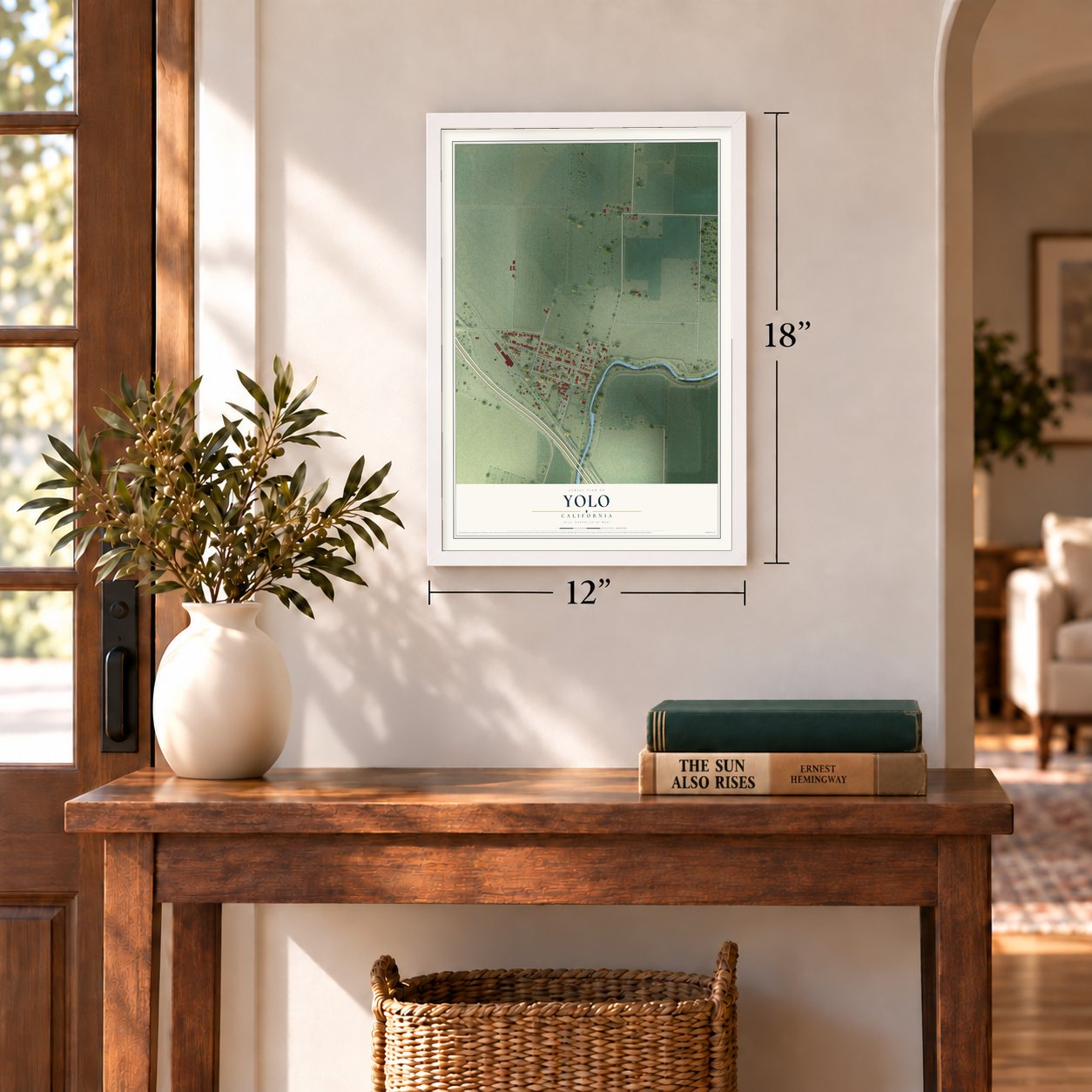 Yolo, California map, 12 x 18 inch print in a white frame in an entryway