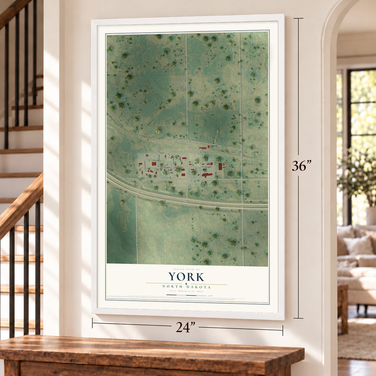 York, North Dakota map, 24 x 36 inch print in a white frame by a staircase