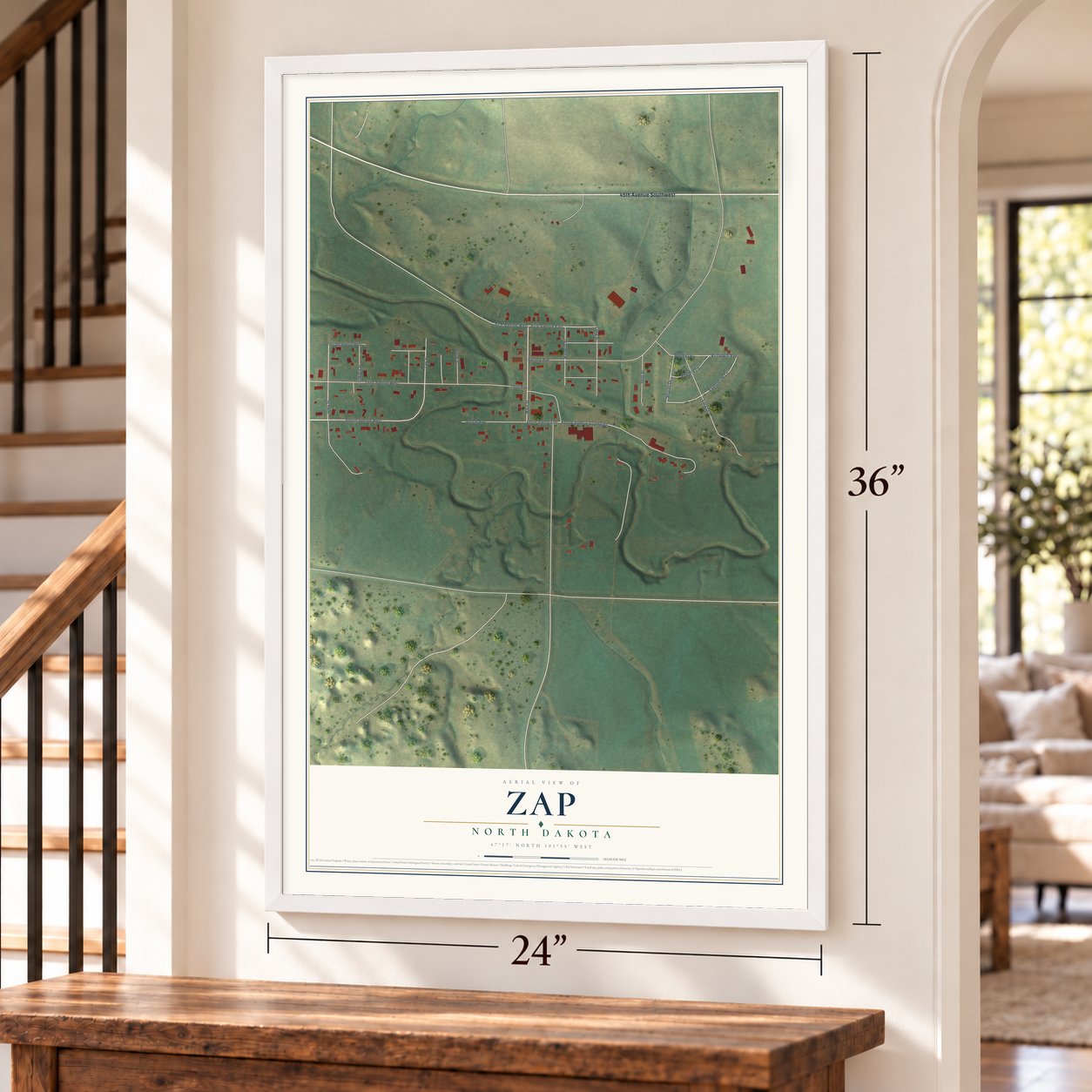 Zap, North Dakota map, 24 x 36 inch print in a white frame by a staircase