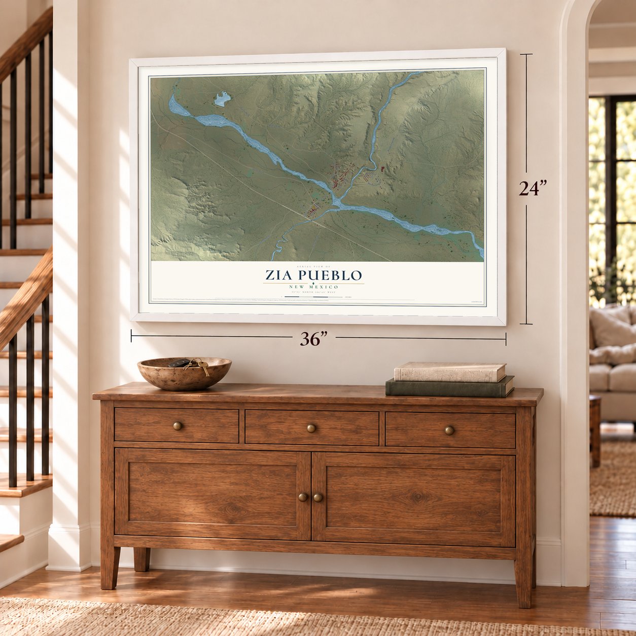Zia Pueblo, New Mexico map, 24 x 36 inch print in a white frame above a dresser by a staircase