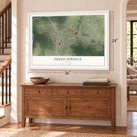 Zolfo Springs, Florida map, 24 x 36 inch print in a white frame above a dresser by a staircase