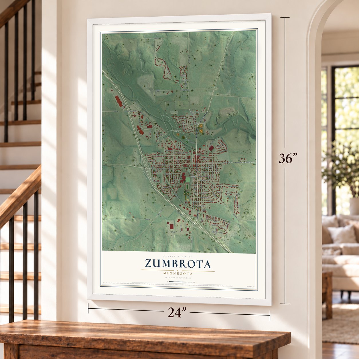 Zumbrota, Minnesota map, 24 x 36 inch print in a white frame by a staircase