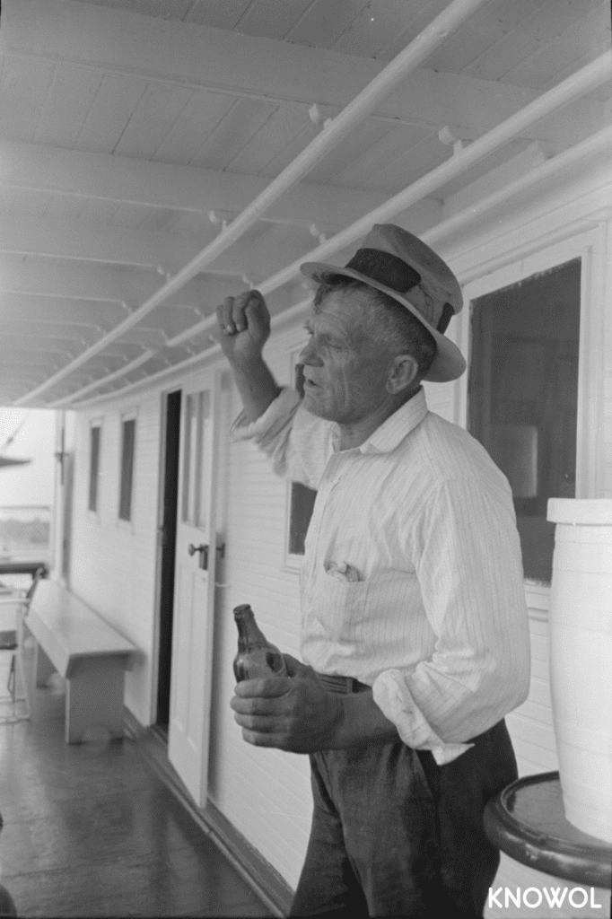 This oyster fisherman from Olga, Louisiana is sailing the Mississippi River aboard a ship called the El Rito.