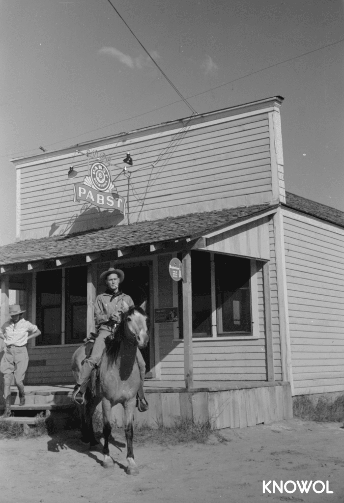 Leaving the bar on horseback.