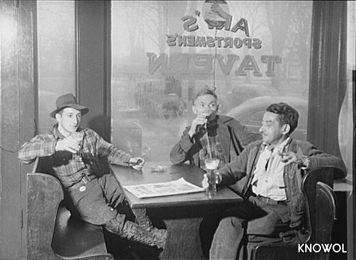 Three men drinking beer in "Art's Sportsmen's Tavern" in Colchester, CT.