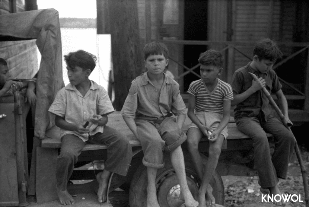 Boys eating sugarcane in the small fishing village of Puerto Real, Puerto Rico.