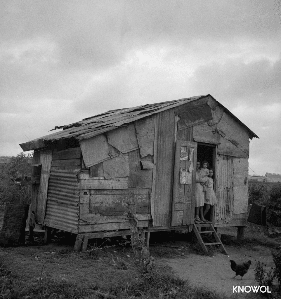 A family in the house they will soon be forced to abandon.