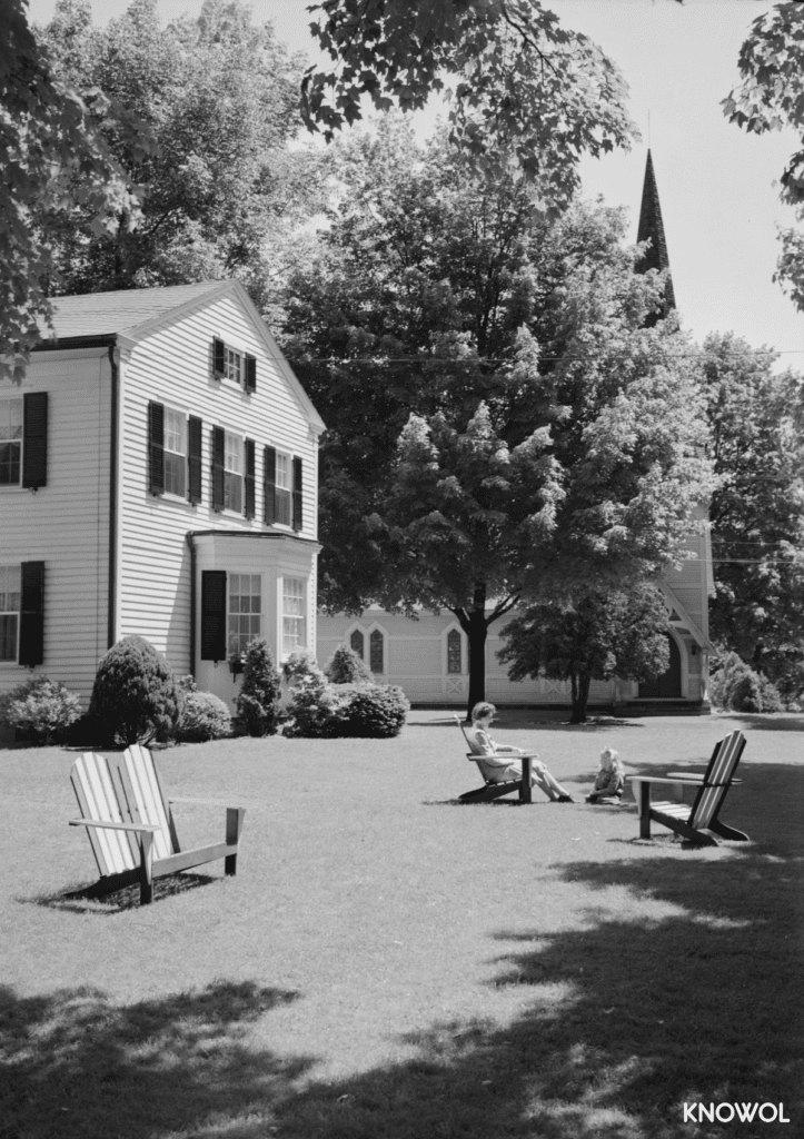 A woman and her daughter lounging in the front yard of their Southington, CT home.