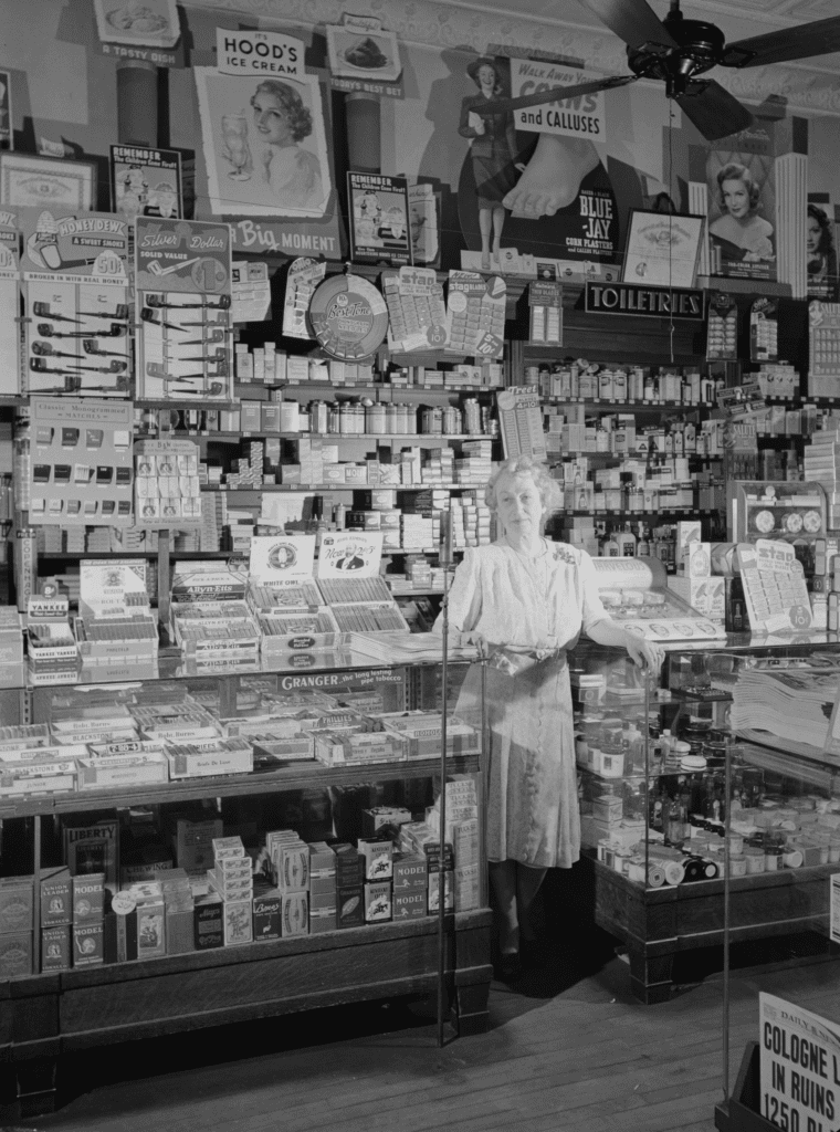Mrs. Ethel Oxley in the drugstore she ran on the town's main street.