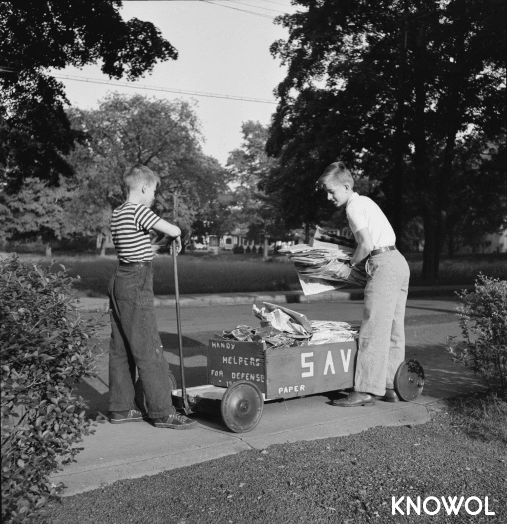 The wagon reads "handy helpers for defense".