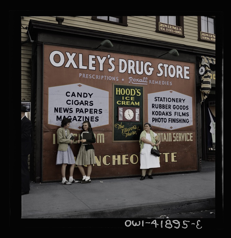 Women standing outside of Oxley's Drug Store in Southington, CT.