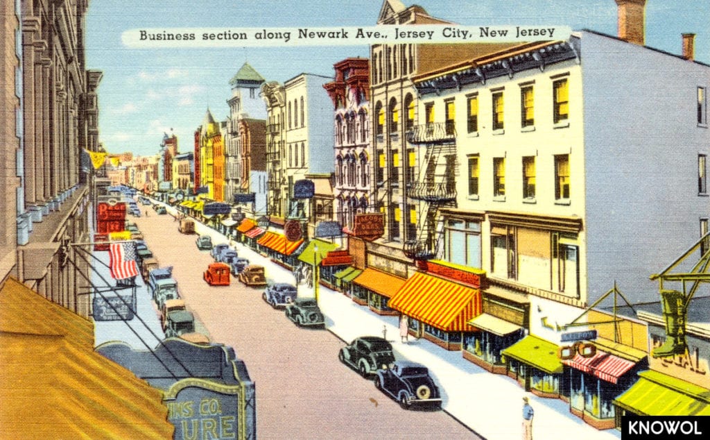 This picture shows a row of businesses along Newark Ave in Jersey City.