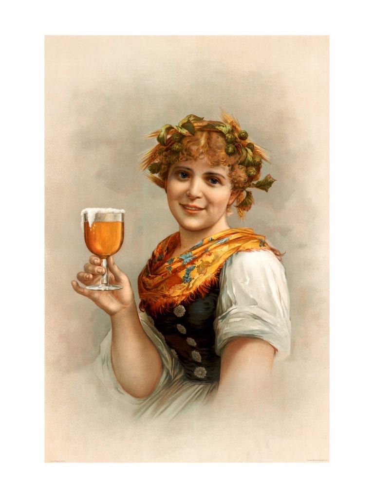 This image shows a smiling barmaid wearing a yellow flowered scarf and black vest with silver buttons, holding a glass of