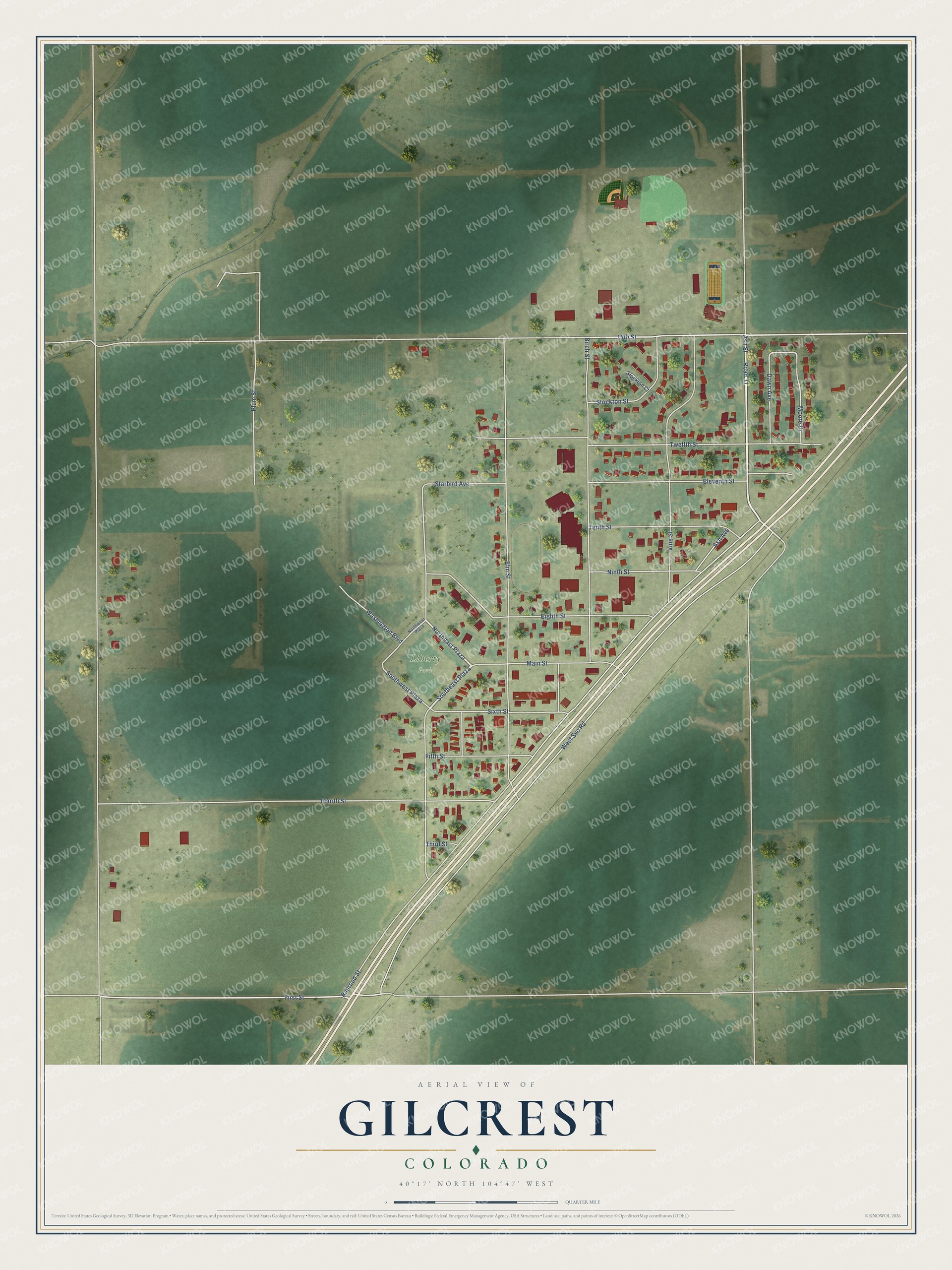 Full map of Gilcrest, Colorado, with red buildings, printed street names and the land around them