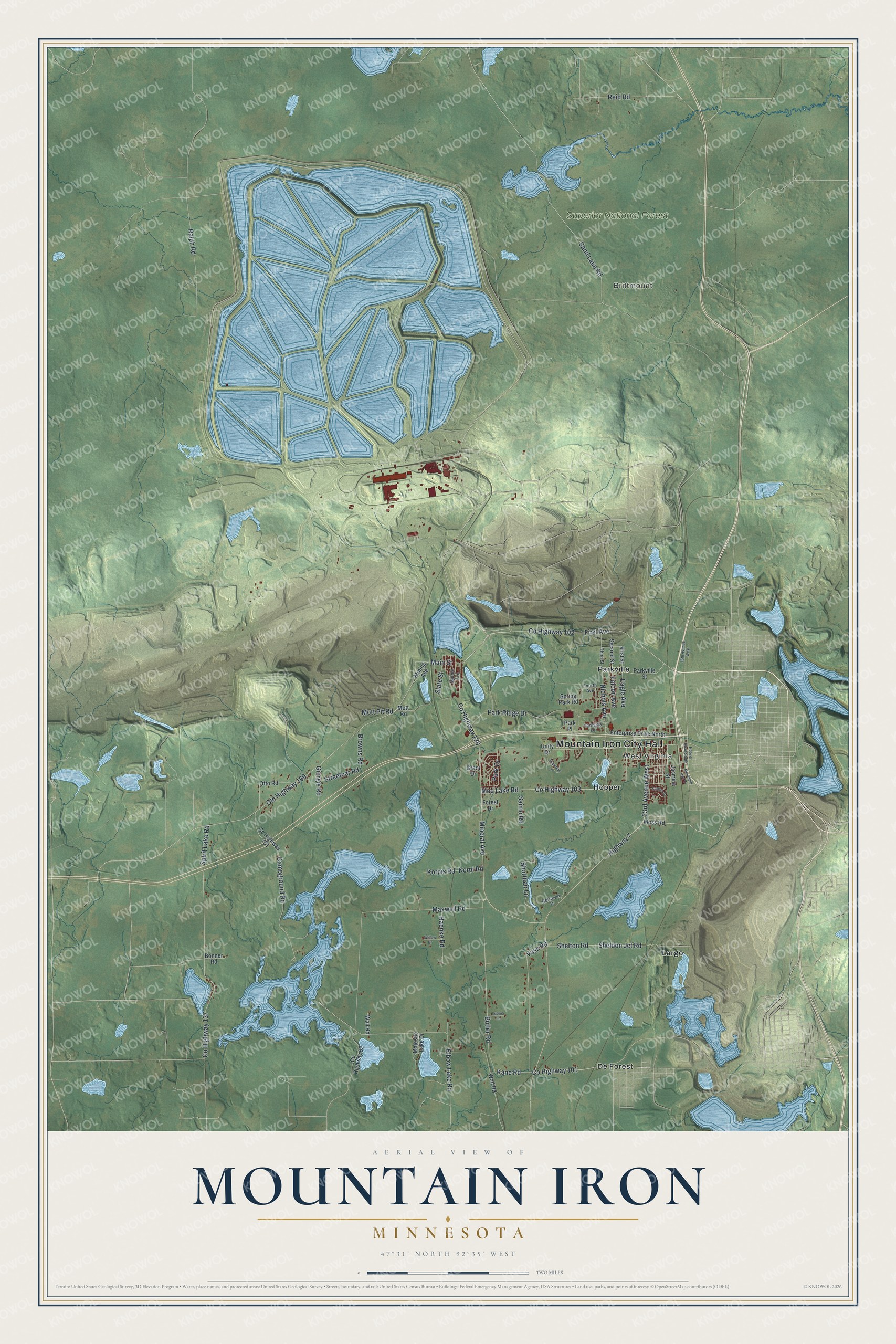 Full map of Mountain Iron, Minnesota, with red buildings, printed street names and the land around them