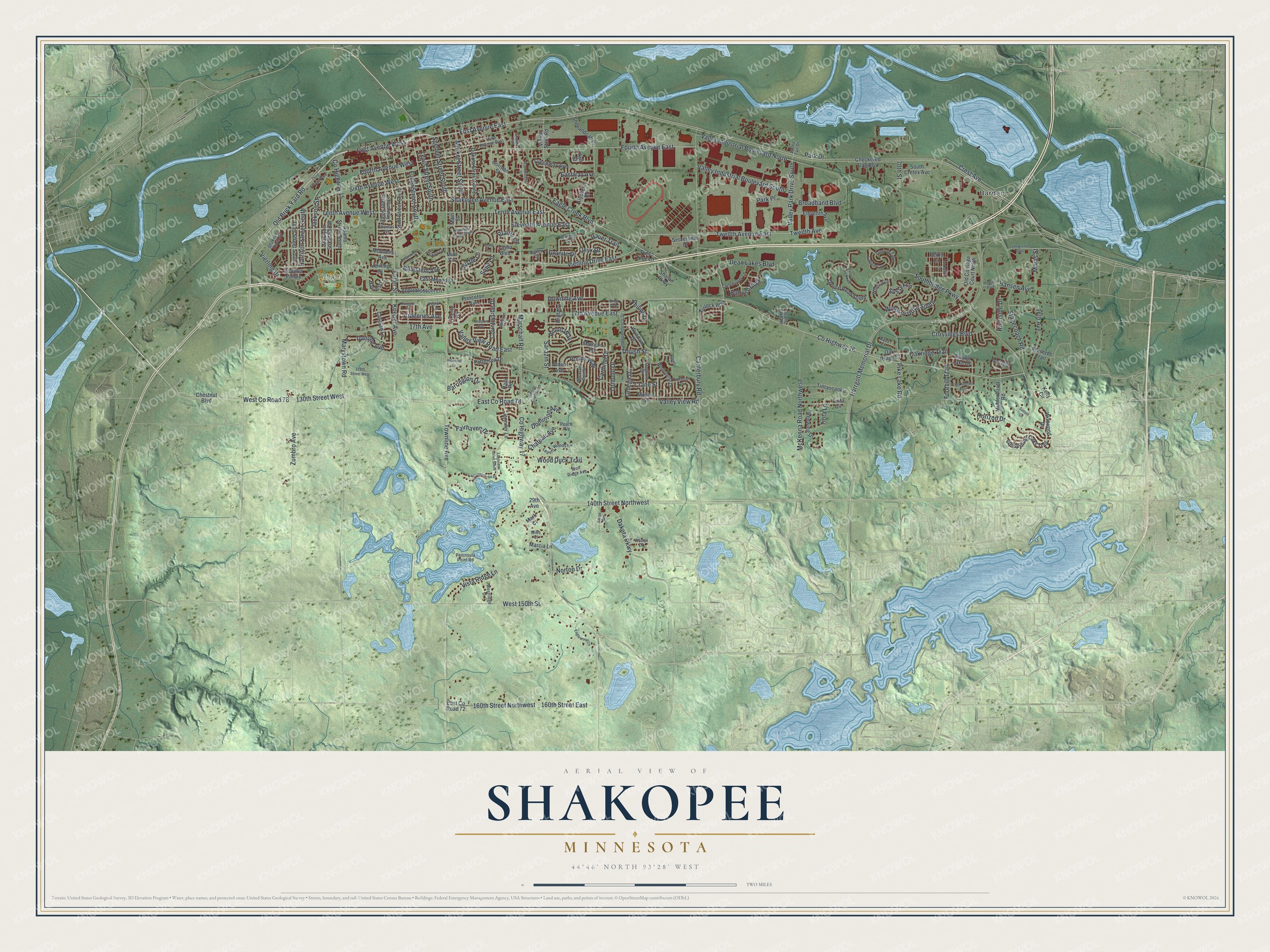 Full map of Shakopee, Minnesota, with red buildings, printed street names and the land around them