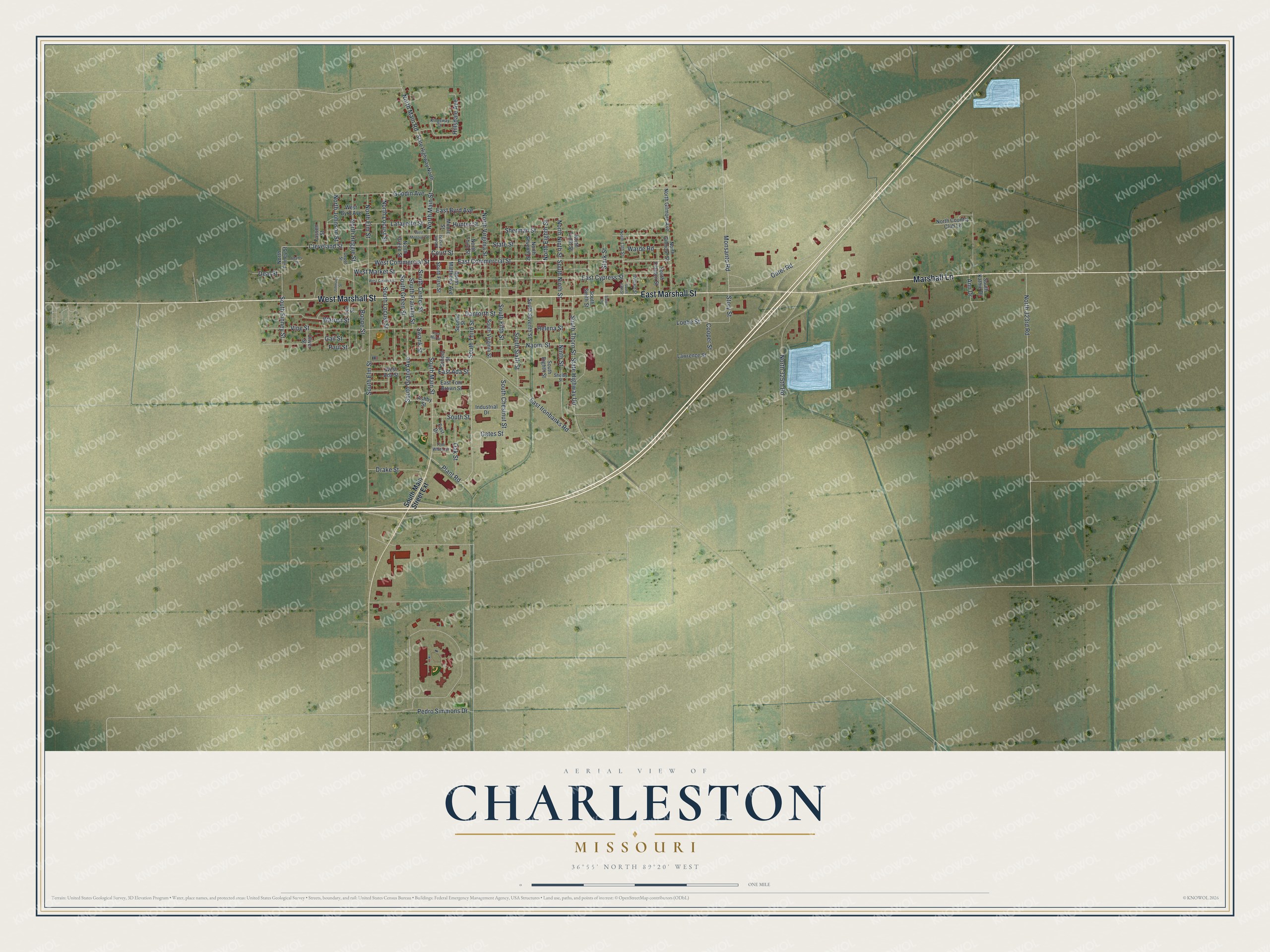Aerial map of Charleston, Missouri, with red buildings along East Marshall Street surrounded by flat green farm fields