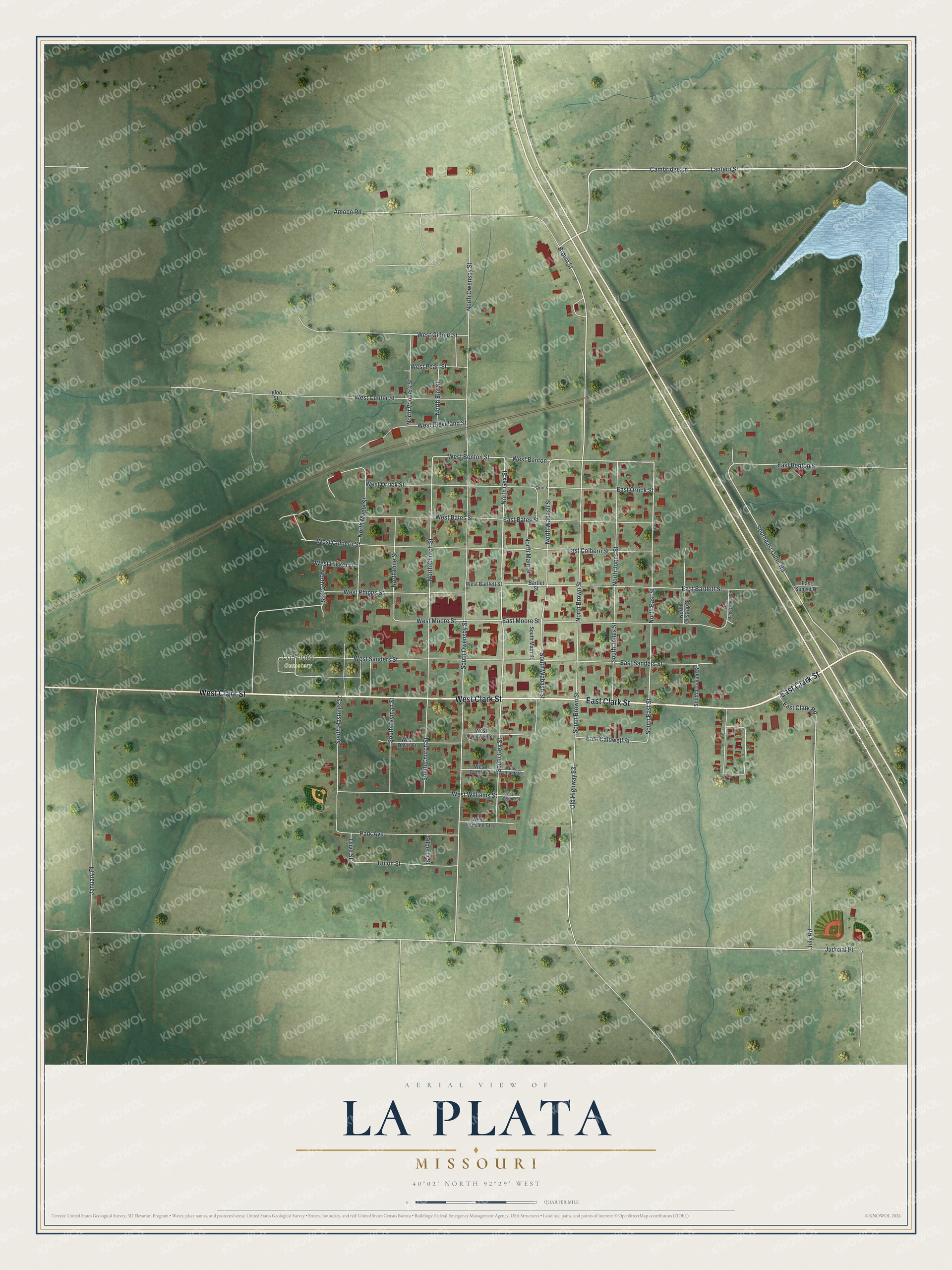 Aerial map of La Plata, Missouri with red buildings on a street grid, green farm fields, rail lines and a blue lake
