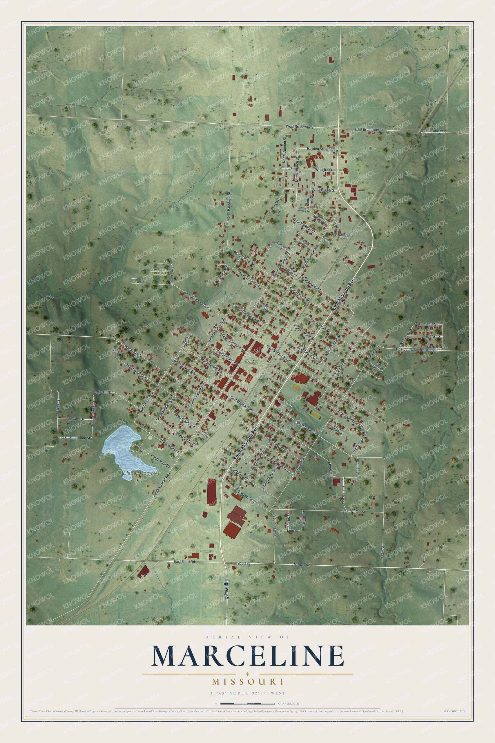 Aerial map of Marceline, Missouri with green hills, red buildings, a diagonal rail line and a small blue lake at the Disney Complex