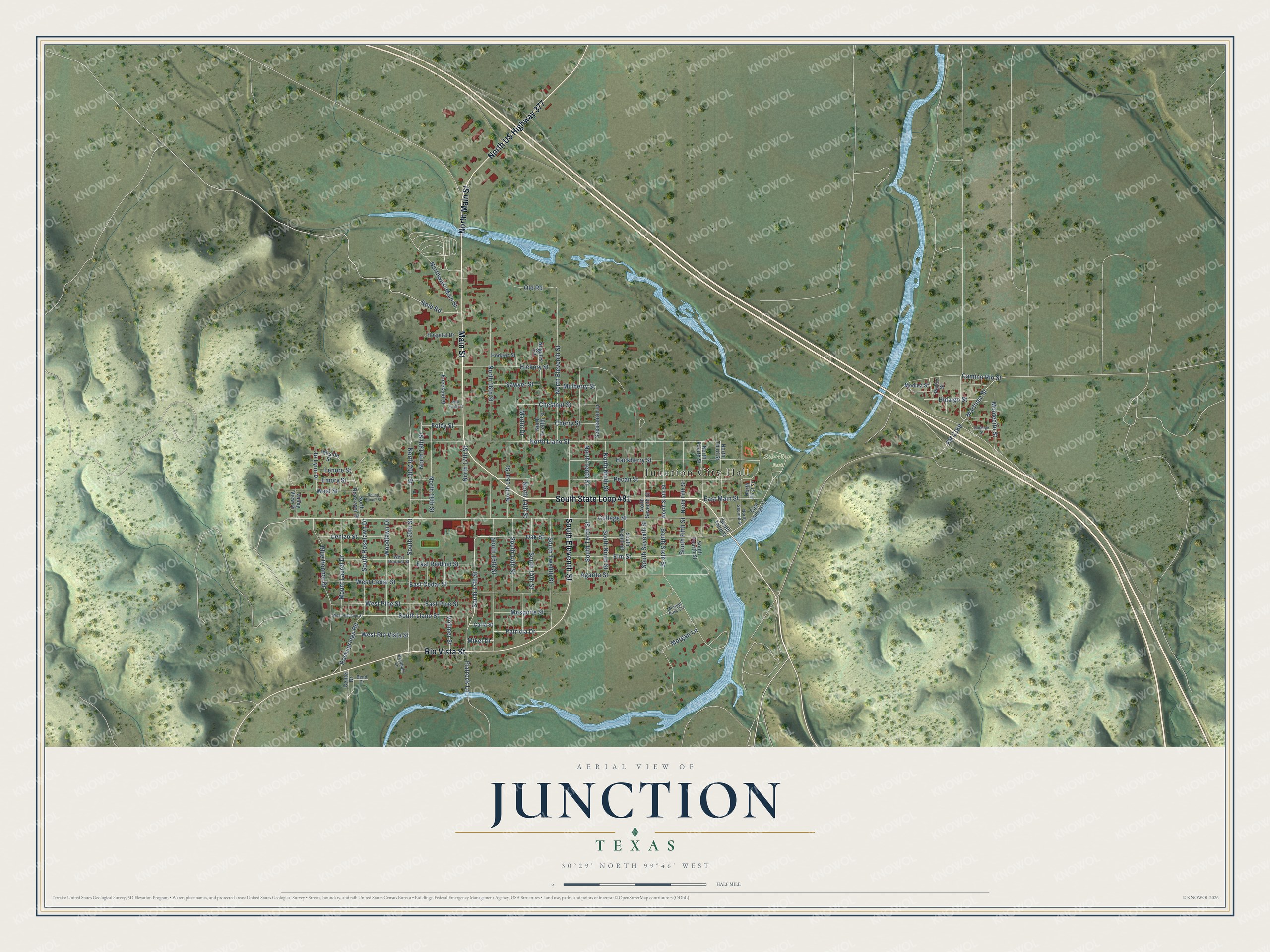 Full map of Junction, Texas, with red buildings, printed street names and the land around them