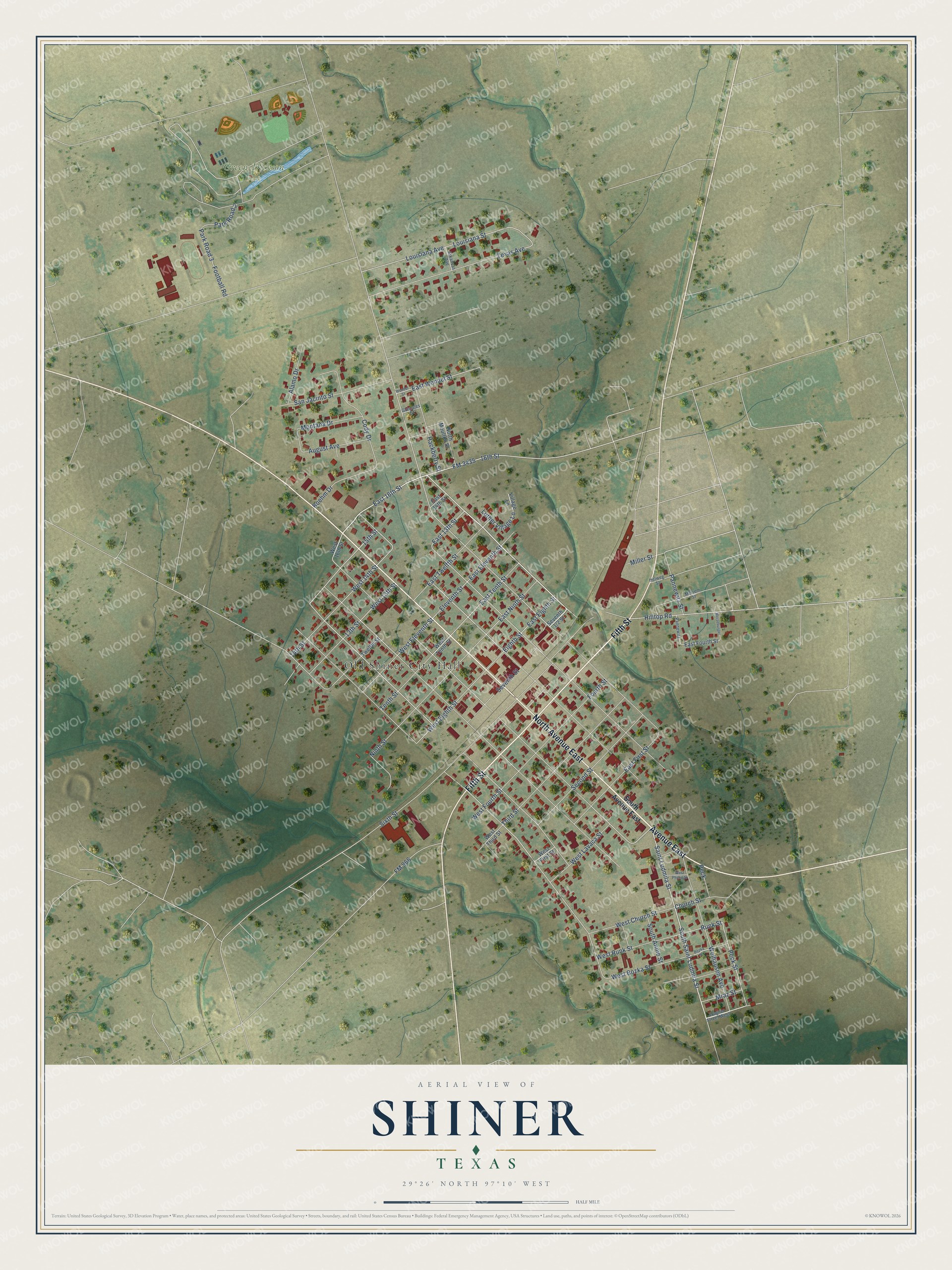 Full map of Shiner, Texas, with red buildings, printed street names and the land around them