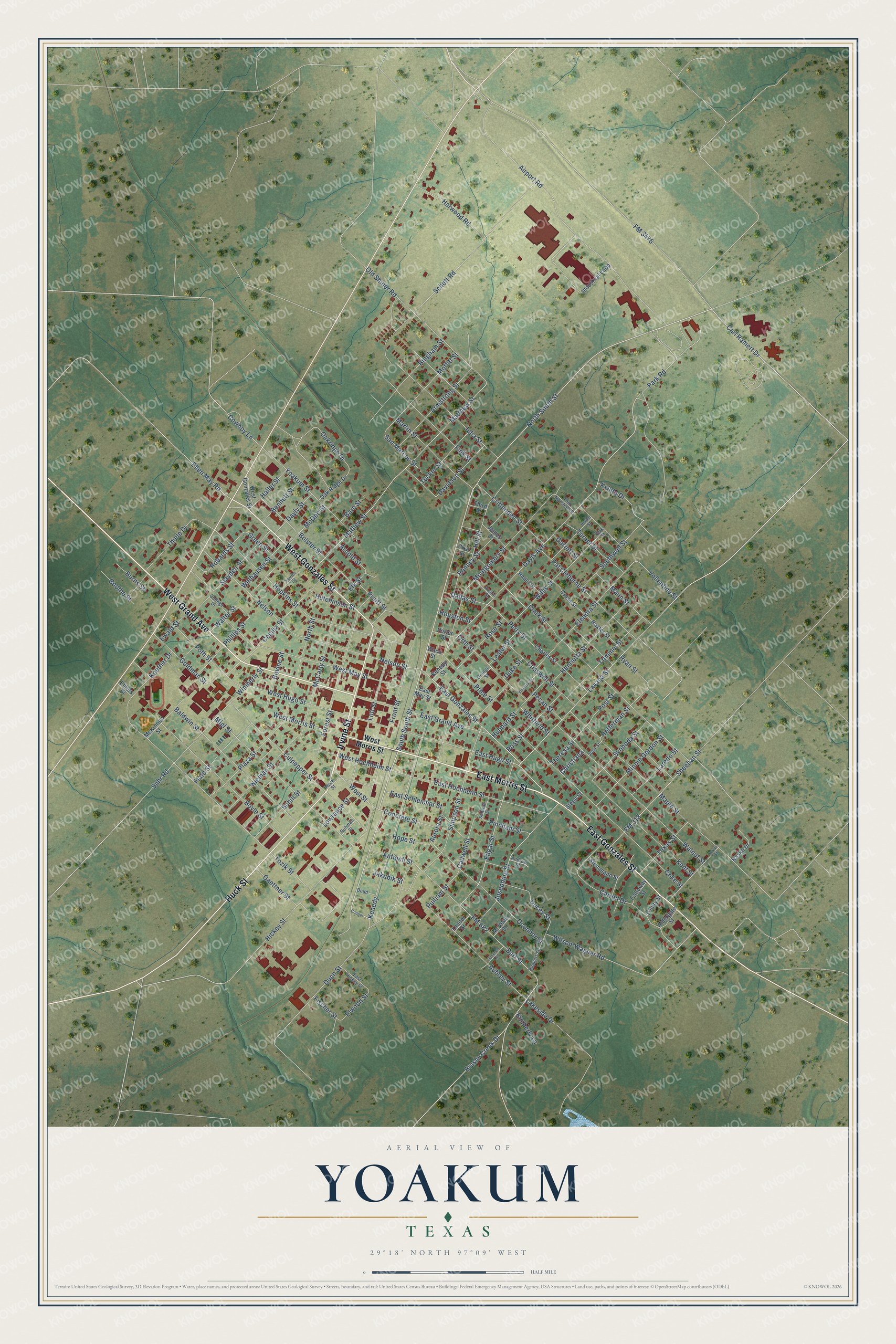 Full map of Yoakum, Texas, with red buildings, printed street names and the land around them