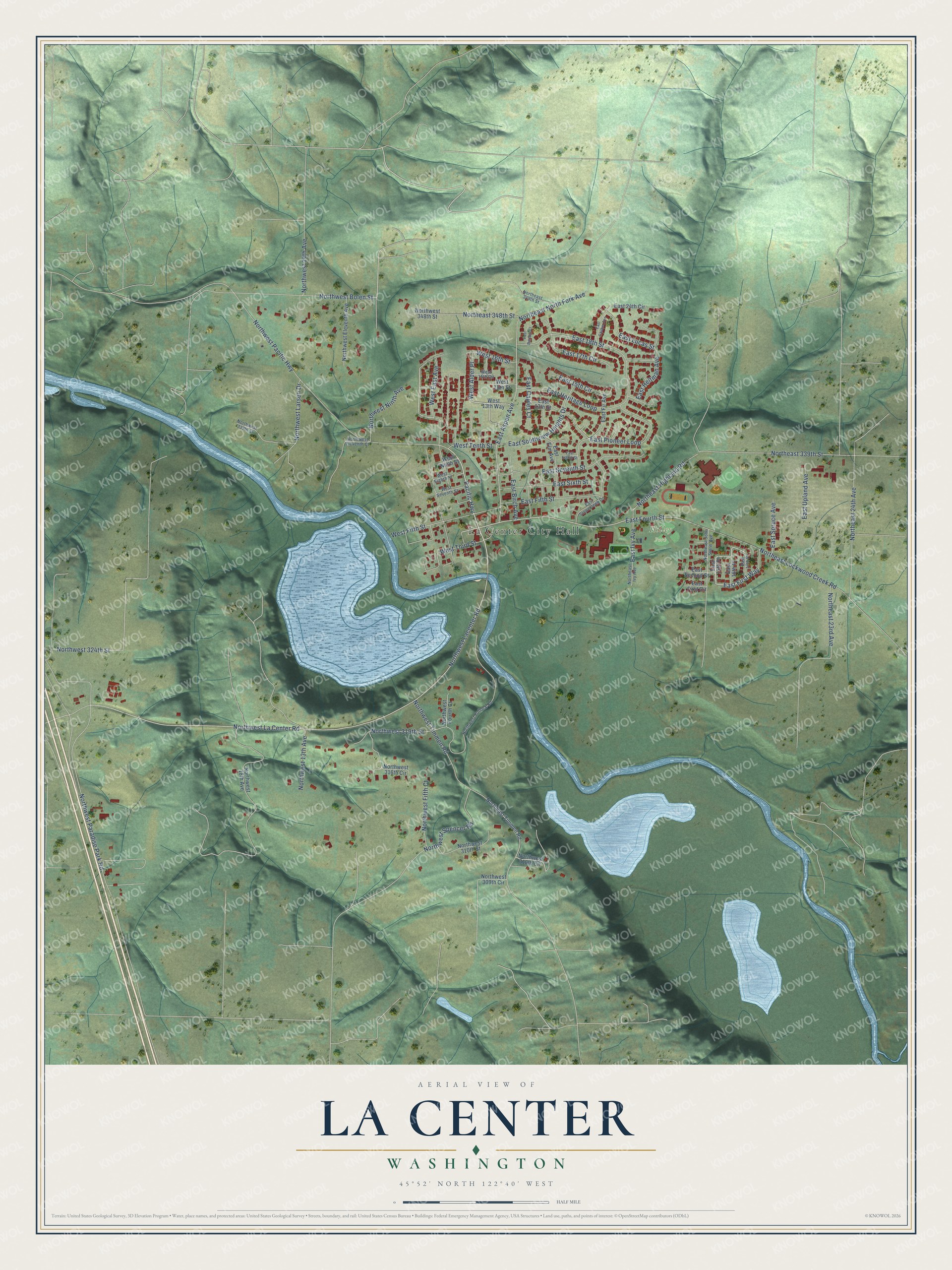 Full map of La Center, Washington, with red buildings, printed street names and the land around them