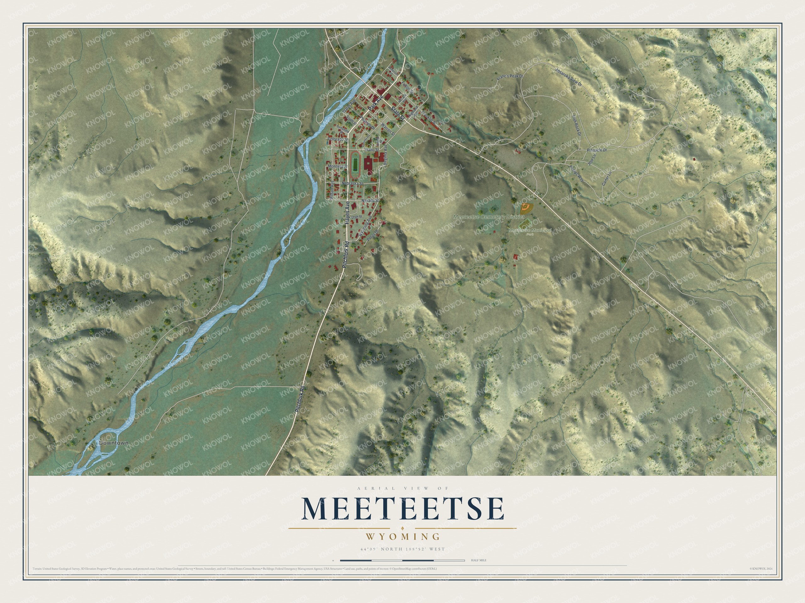 Full map of Meeteetse, Wyoming, with red buildings, printed street names and the land around them