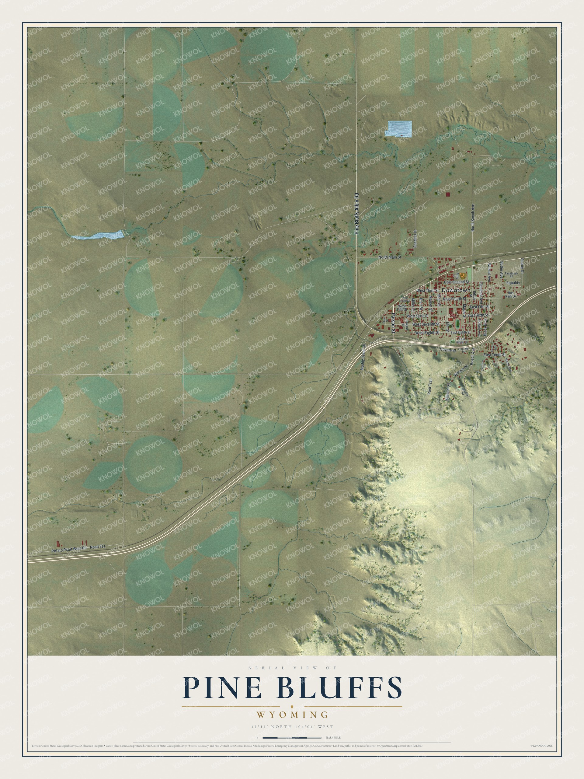 Full map of Pine Bluffs, Wyoming, with red buildings, printed street names and the land around them