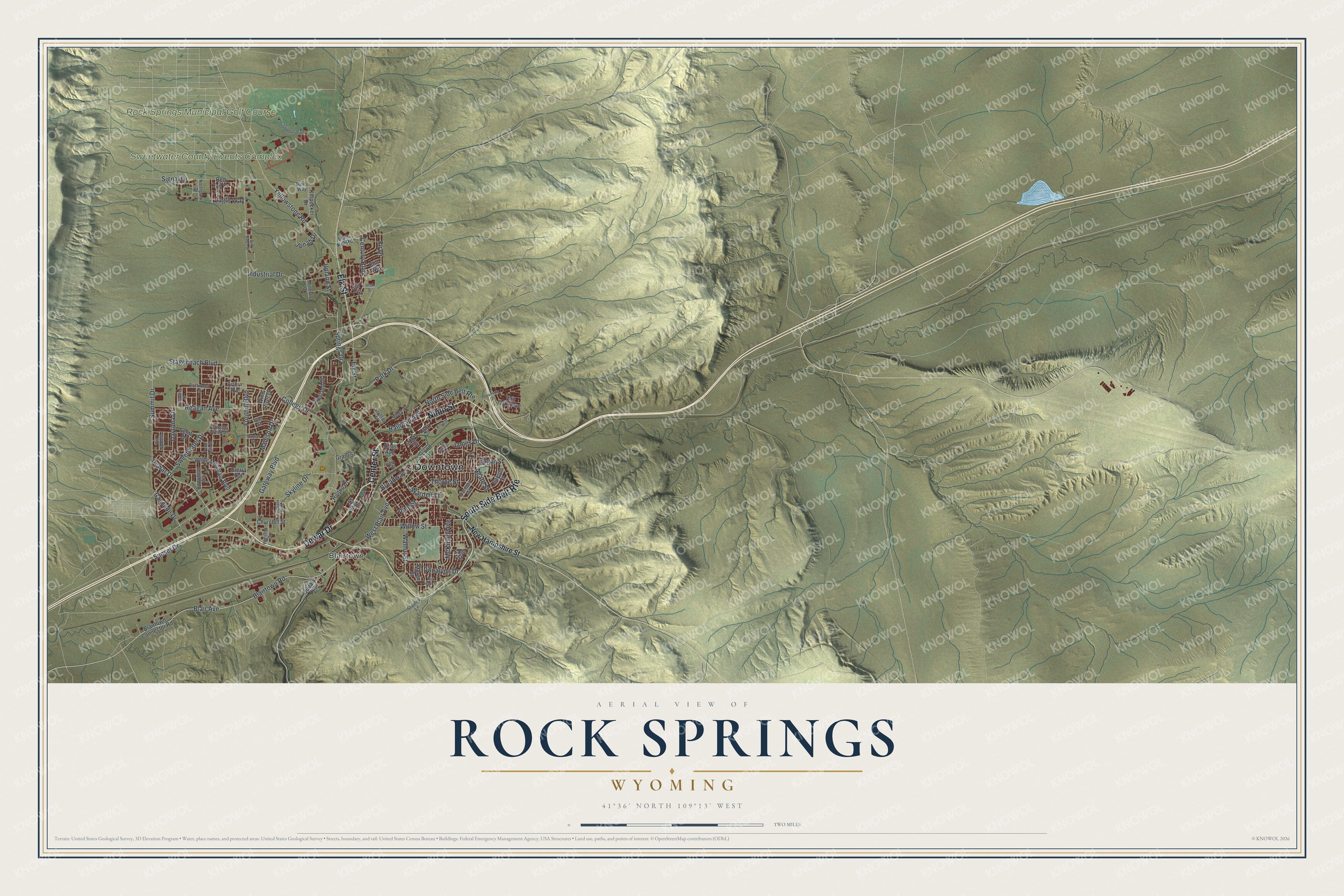 Full map of Rock Springs, Wyoming, with red buildings, printed street names and the land around them