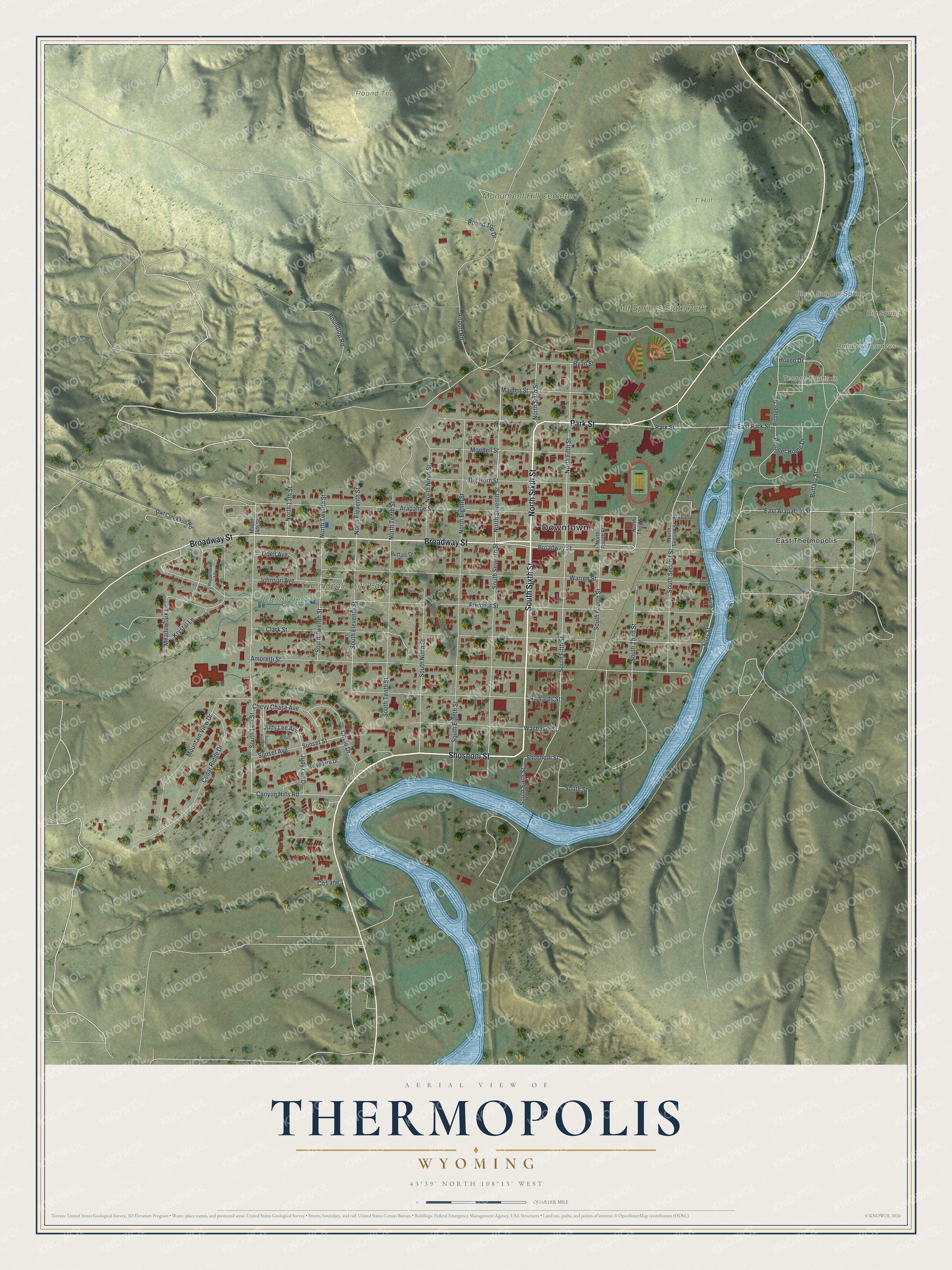 Full map of Thermopolis, Wyoming, with red buildings, printed street names and the land around them